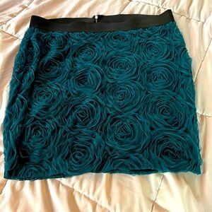 Bundle and get another item for $10!! TORRID SKIRT-green -roses.Size 16!